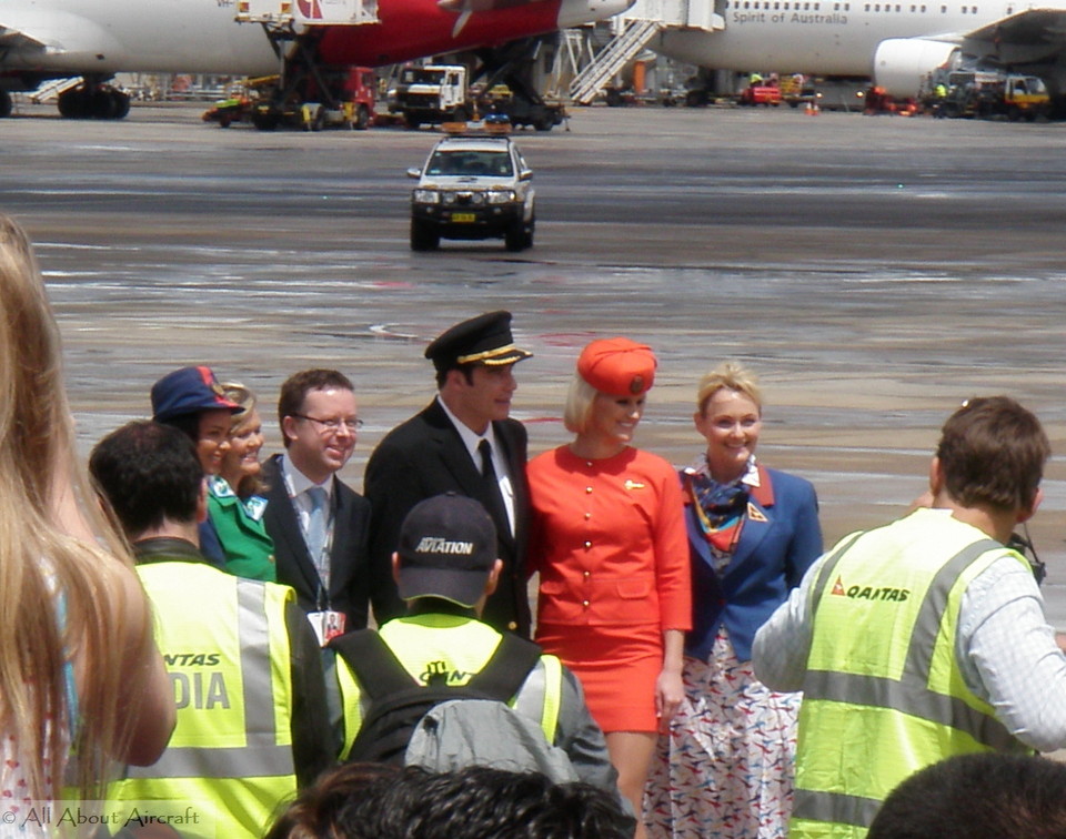 John Travolta being greeted by QANTAS CEO Alan Joyce