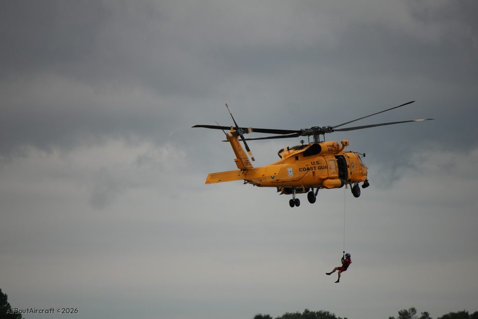 Coast Guard Jayhawk 6042 hoisting a swimmer