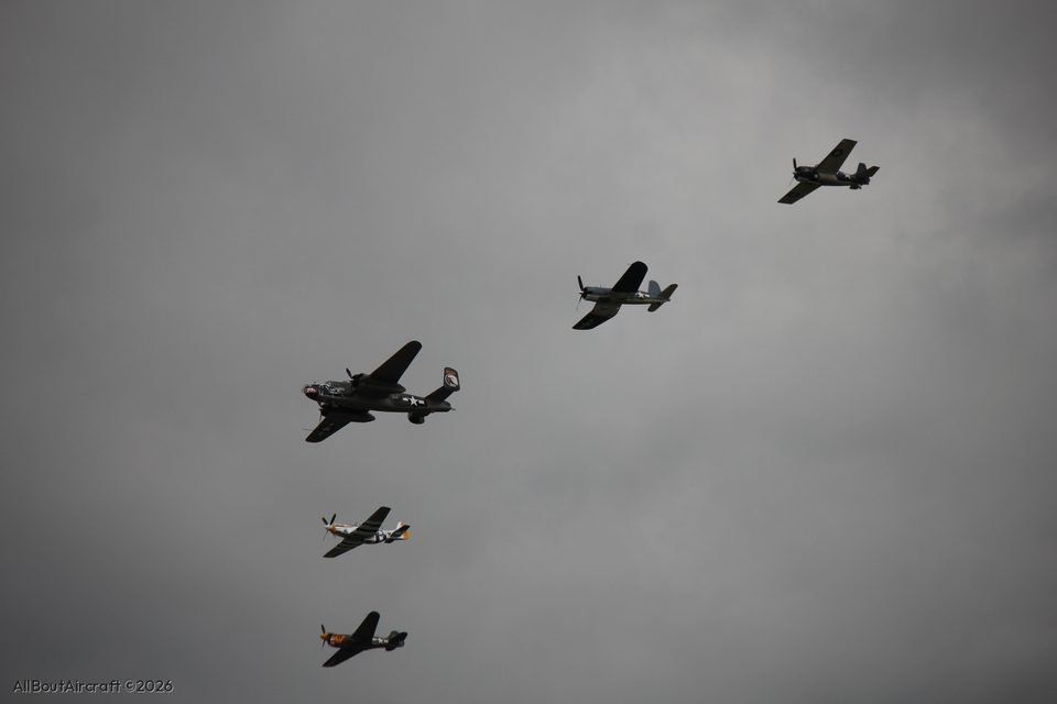 B-25 Betty's Dream with navy fighters and Mustangs