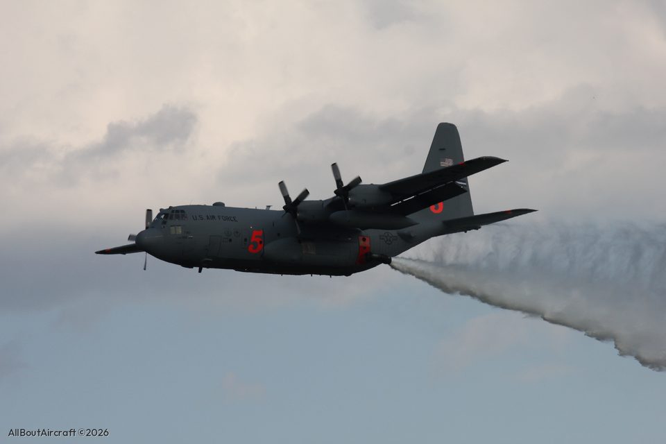 USAF C-130, number 5, dropping water