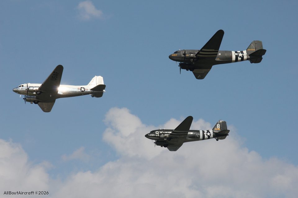 C-47s, one in polished metal